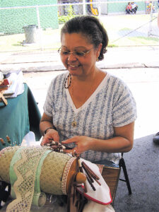 Olga Hernandez making lace at the Festival de Mundillo, Moca